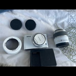 Nikon 1 J2 mirrorless camera with 10-30mm VR Zoom Lens (White)
